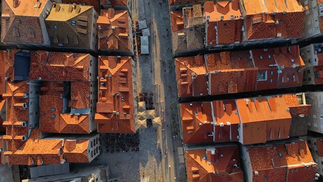 Drone footage of the City of Dubrovnik Croatia with the red roofs at sunset