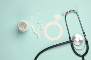 Male gender symbol with pills and stethoscope on blue background