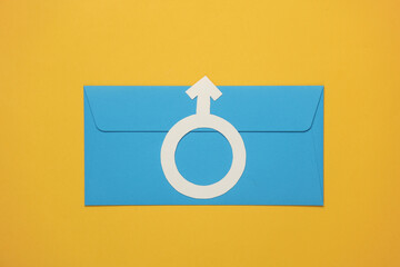 Male gender symbol with envelope on yellow background