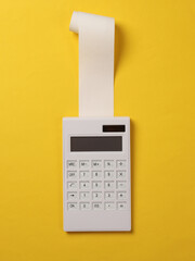 Blank Cash Receipt Sales Check and Calculator on yellow background