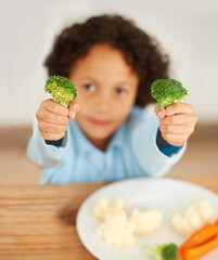 Boy, broccoli and vegetables plate for healthy nutrition meal, diner wellness or food eating. Male...