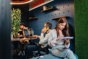 Team of Diverse Professionals Collaborating in a Creative Co-Working Space