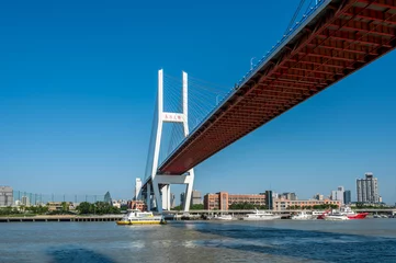 Afwasbaar Fotobehang Nanpubrug Nanpu Bridge on the Huangpu River in Shanghai, China