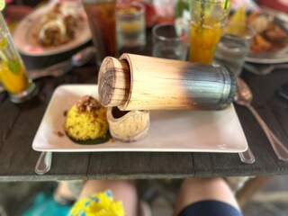 A plethora of Southeast Asia cuisune dishes - both main dishes and desserts, vegetarian and regular - from the kitchens of Bali and Phnom Penh