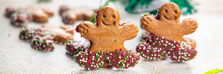 gingerbread man christmas gingerbread cookies cinnamon, vanilla, ginger christmas sweet dessert holiday baking treat new year and celebration meal food snack on the table copy space food background