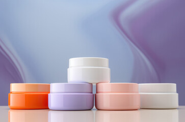 Five cosmetic cream  jars on clean colorful background. Beauty products.