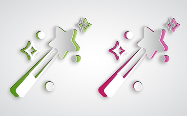 Paper cut Magic wand icon isolated on grey background. Star shape magic accessory. Magical power. Paper art style. Vector