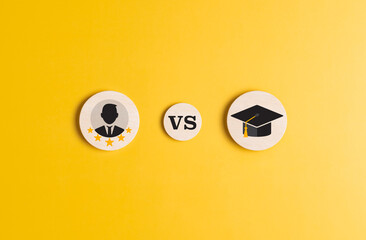 Knowledge vs Experience. Wooden label with Study vs Work icon options on yellow background. Job...