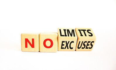 No excuses limits symbol. Concept words No excuses No limits on wooden block. Beautiful white table white background. Business motivational no excuses limits concept. Copy space.