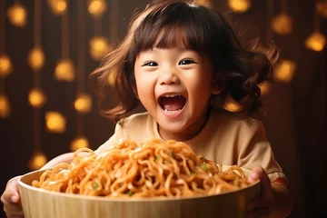 Plexiglas foto achterwand child eating spaghetti © lichaoshu