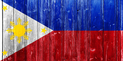 Flag of Republic of the Philippines on a textured background. Concept collage.