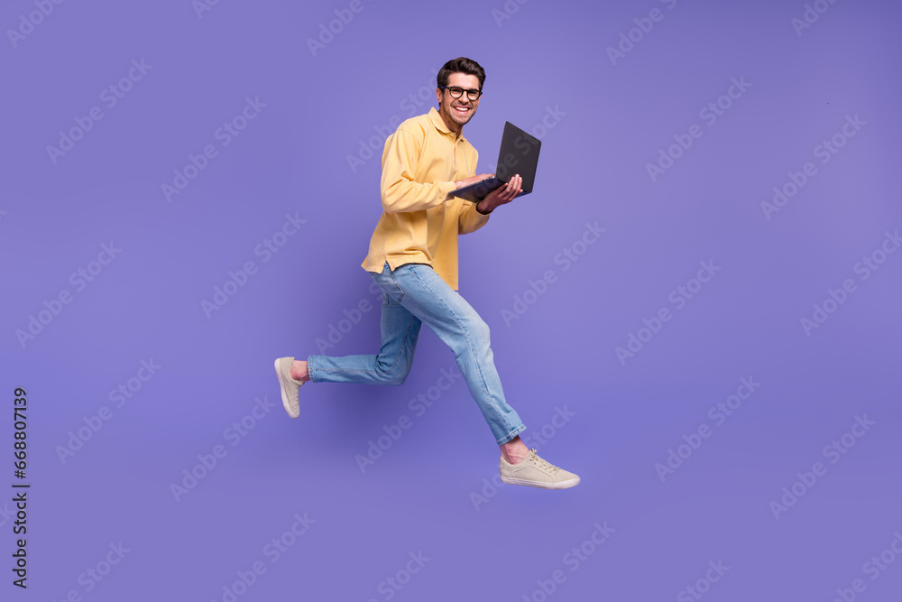 Aufkleber Full body length photo of running team leader programmer multitask manager much ideas jump use netbook isolated on violet color background