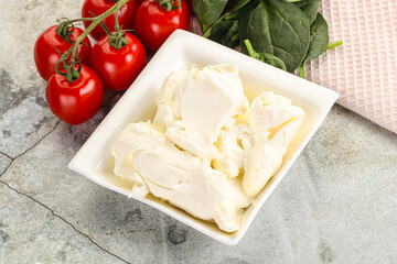 Soft cream cheese in the bowl