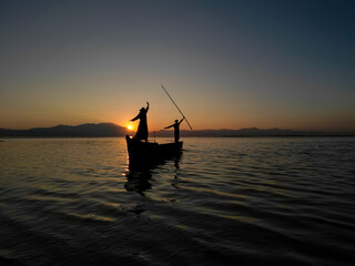 The harmonious, motivational and energetic movements of fishermen couples and their time going to...
