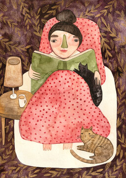 A girl reading a book in the bed, accompanied by two cats