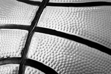 Detailed texture of unusual white basketball. Macro view of sports equipment