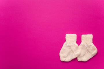 World Prematurity day concept. Banner with the pair of socks