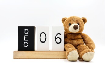 Cuddly bear and date of December 6. Saint Nicholas concept.