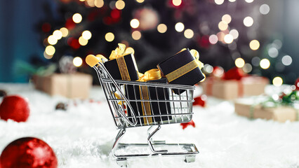 Shopping cart with Christmas gifts box