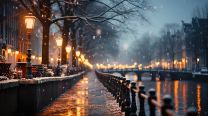 Fotobehang Amsterdam canal at night with lights and snowfall, Netherlands. © AS Photo Family