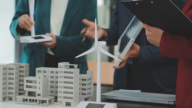 Business team people meeting and talking with engineer and architecture about planning and drawing of building construction project, smart executive professional working at outdoor, teamwork concept