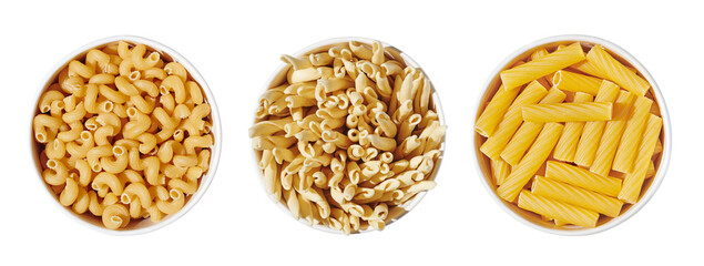 Various pasta noodle in bowl isolated on white, close up