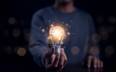 New idea innovation concept, Man holding Light bulbs with Brain inside and digital connection line. Creative and innovation inspiration. Idea and imagination, Business Bright idea, Science innovation,