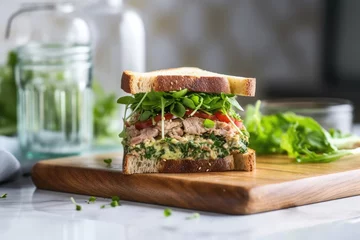 Keuken spatwand met foto a tuna and lettuce sandwich under a glass cover © Alfazet Chronicles