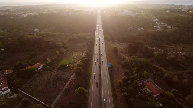 Aerial drone cinematic POV tracking of A5 highway in Cascais, Portugal