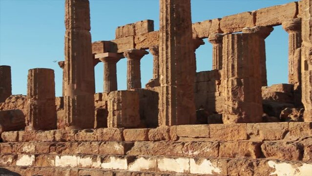 agrigento sicily italy ancient temple of juno pillars medium shot pan right to left