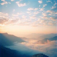 a landscape of mountains and clouds