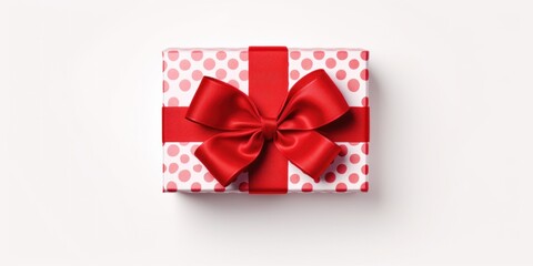 Gift Box With Red Ribbon Bow. Wrapping Package For Birthday, Anniversary, Holiday. Overhead View of Festive Surprise Decoration.