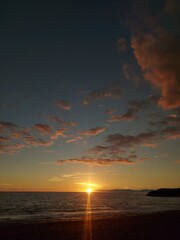 sunset over the sea red and orange