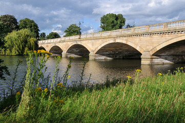 Fototapeta na wymiar Serpentine Bridge in Hyde Park in London, UK, in the afternoon sunshine.