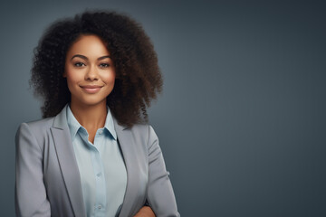 Beautiful black-skinned business woman, smiling, pretty, charming, office worker, positive, well-proportioned, delicate face, facing the public. gradient gray background, soft lights - obrazy, fototapety, plakaty