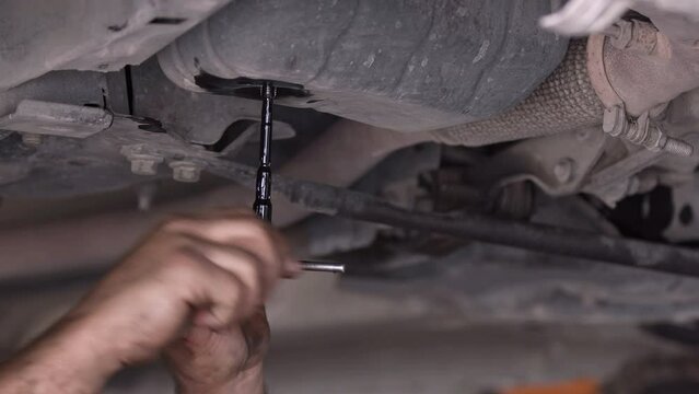 Car Repair Shop Opening The Transmission Oil Cap Footage.