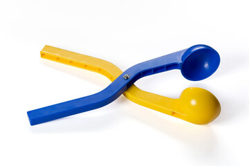 Yellow and blue plastic snow ball maker for winter fun