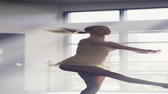 Woman practicing contemporary dancing in dance studio - vertical / Lehi, Utah, United States