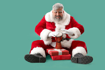 Cool Santa Claus with gift boxes playing djembe on turquoise background