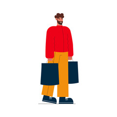 Happy Man carrying shopping bags vector flat illustration. Young man preparing presents for Christmas and New year. 
