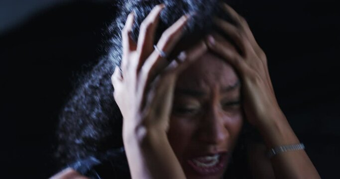Woman, face and kidnapping victim screaming with stress, fear and danger for terrorism and horror. Scared girl, ransom and portrait of female hostage in crisis, prison and cry for help in dark room.