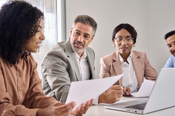 Busy diverse multiethnic young and older professional business people employees team working in...