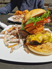 cheeseburger for lunch on a sunny day