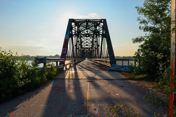 a closed bridge at sunset
