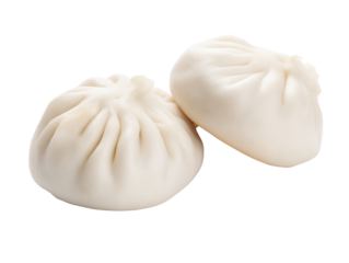 Steamed buns, also known as baozi, are soft, fluffy Asian bread rolls traditionally filled with savory or sweet ingredients, such as barbecued pork, vegetables, or red bean paste.
