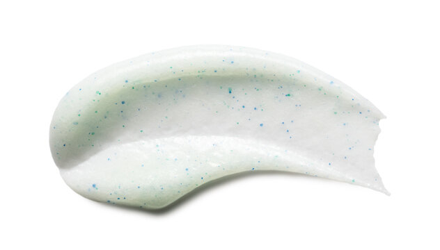 Face scrub smear swatch isolated on white. Exfoliating skincare product smudge. White creamy cleanser with blue particles closeup