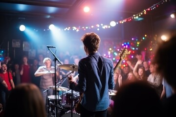 An 18th birthday for a boy: The garage turned into a concert venue as the young man celebrated with friends, parents, and grandparents, showcasing his musical talent.
