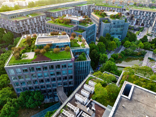 Aerial photography of a green city. There are many plants and ventilation equipment on the roof,...