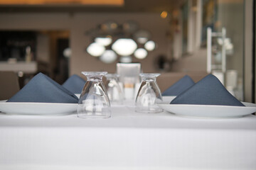 served and decorated round festive table in a restaurant 