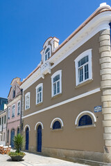 Fototapeta premium Aveiro, beautiful city in Portugal, old blue house with azulejos, on the canal, in the historical center 